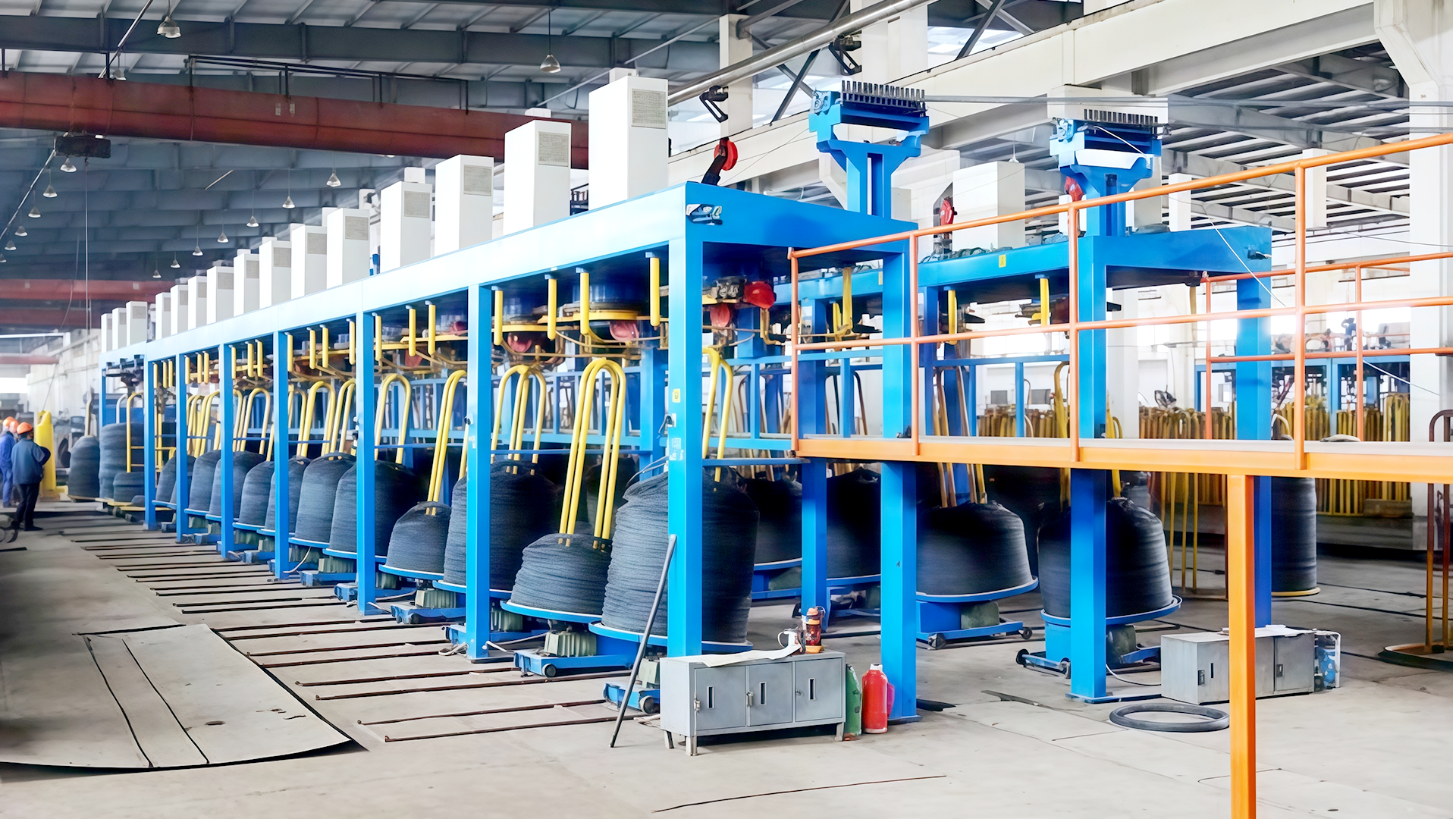 How does the Wire Take-Up Machine ensure uniform tension during the wire winding process?